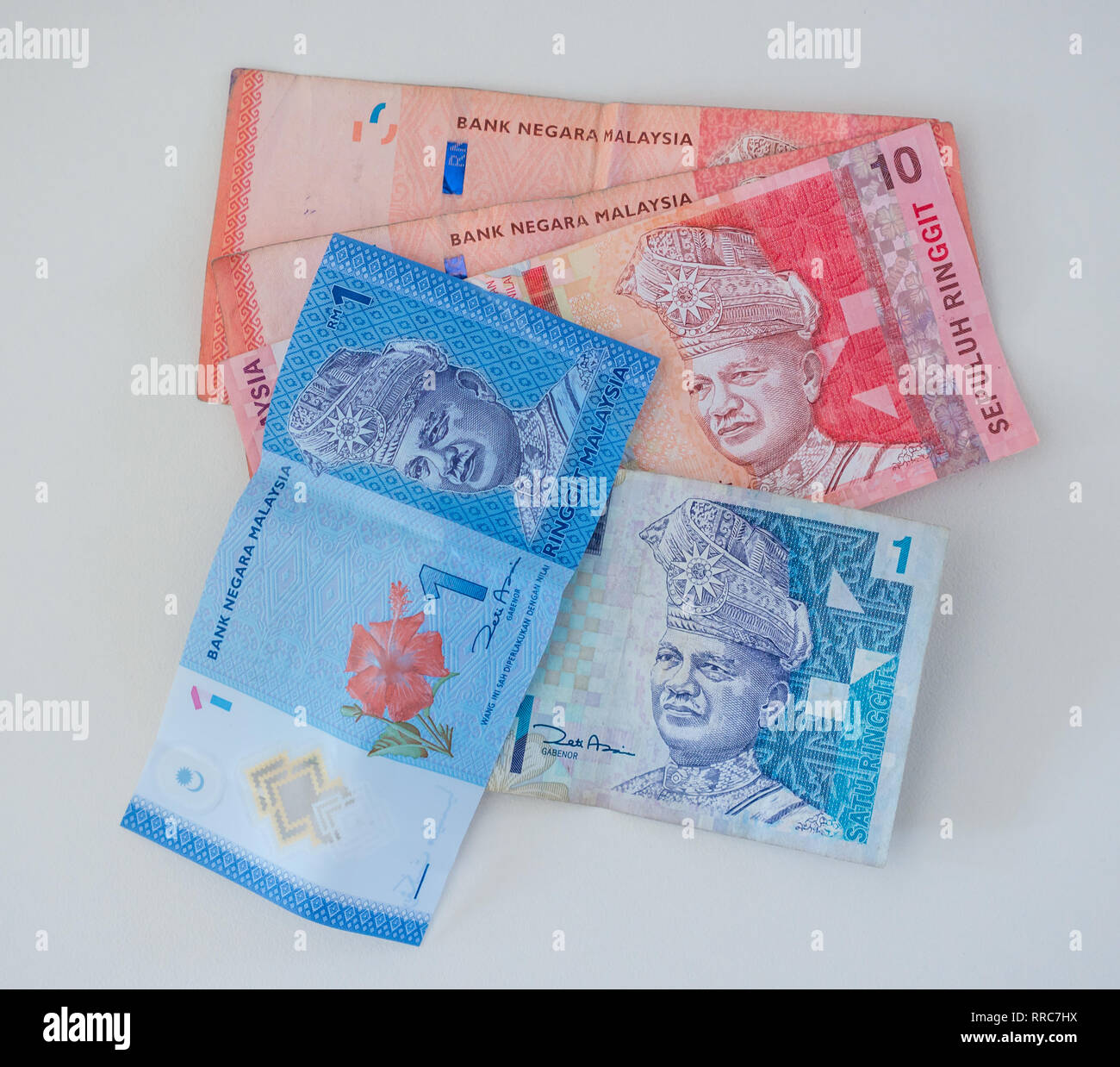 Foreign money banknotes; Malaysian Ringgit, 10 Ringgit and 1 Ringgit notes Bank Negara Malaysia Stock Photo