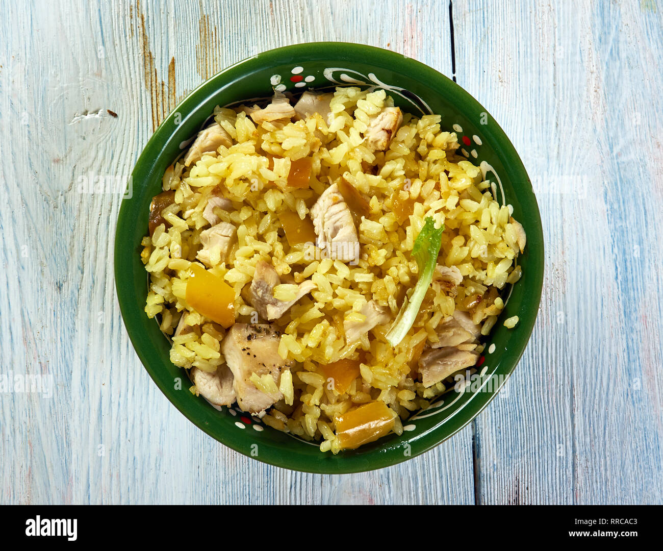 One Pot Cuban Yellow Rice with Chicken and Sausage Stock Photo - Alamy