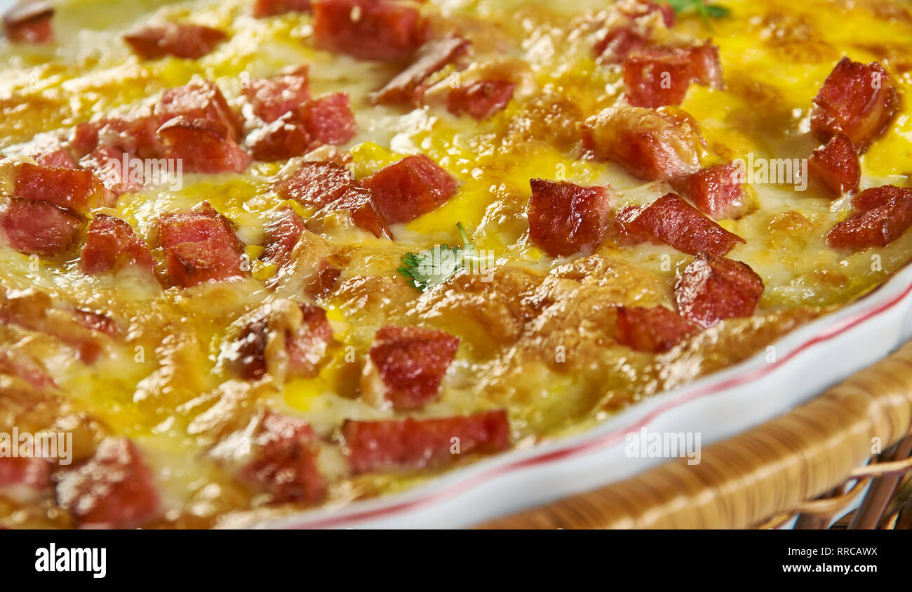 Twice Baked Potato Casserole, Smash the potatoes with a potato masher