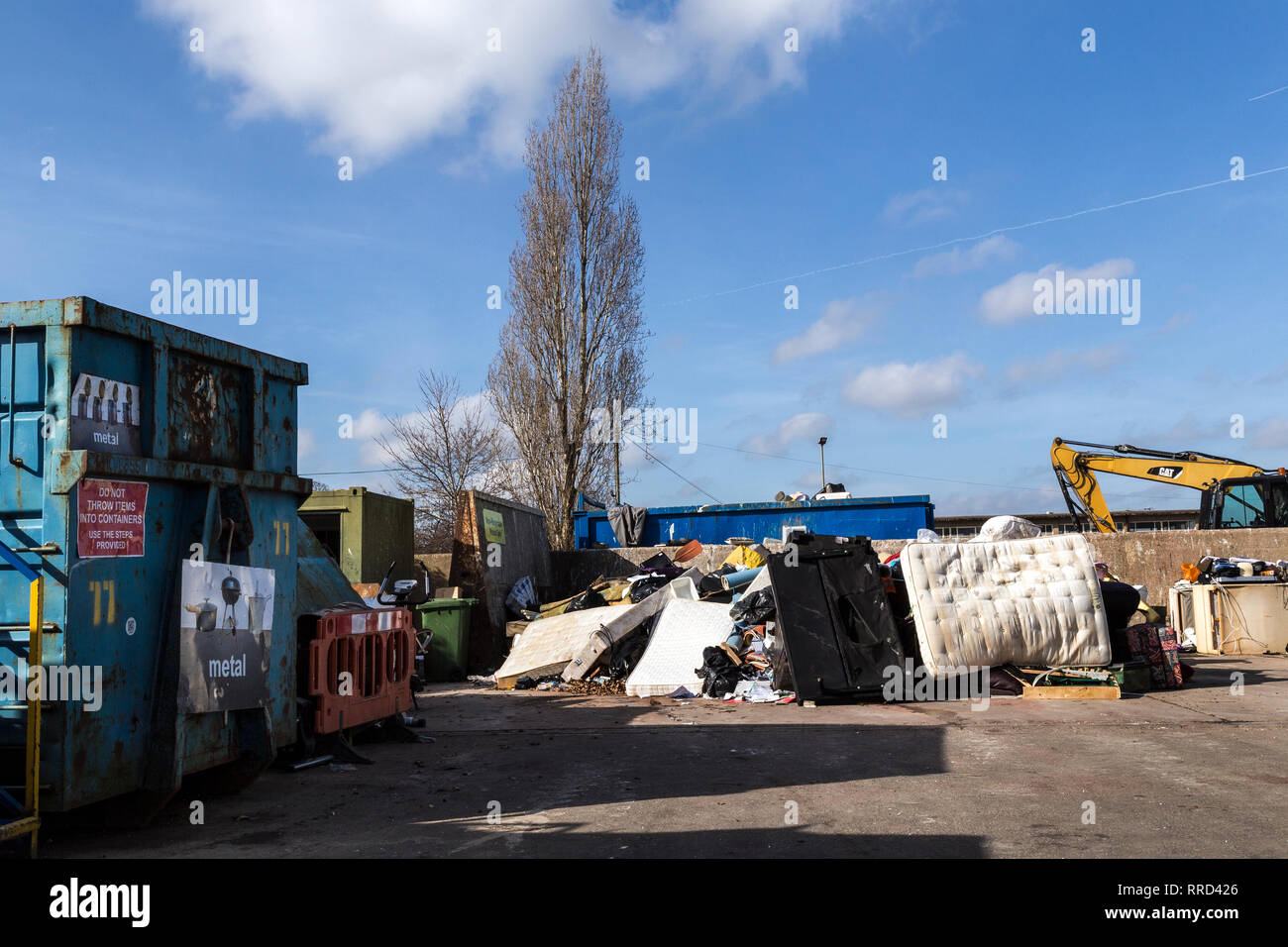 recycling yard,Recycling, Scrap Metal, Metal, Front or Back Yard, Crane - Construction Machinery, Construction Site, Gripping, Business Finance and In Stock Photo