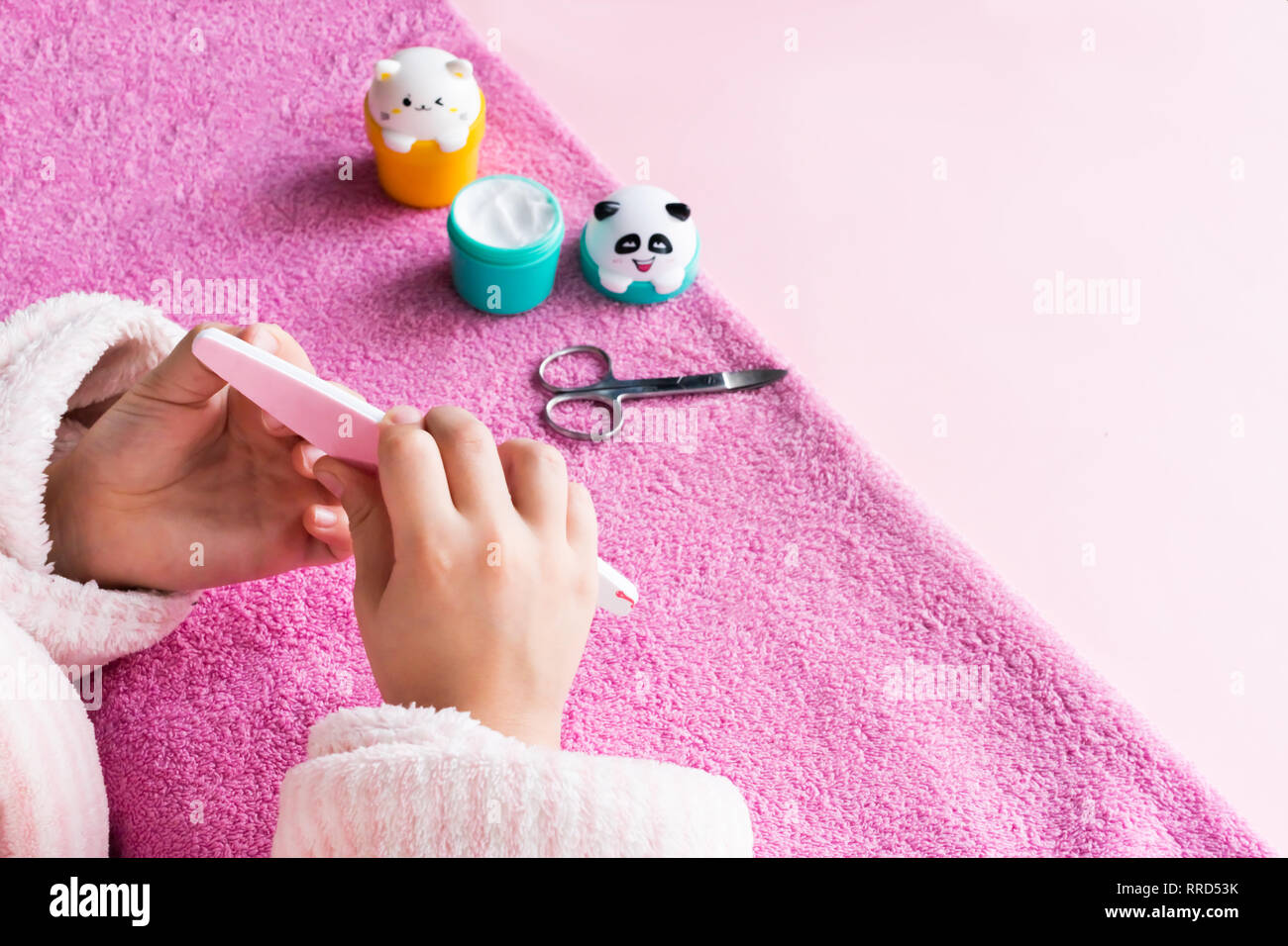 Spa treatments for hand skin and nails for children. Young girl's hands