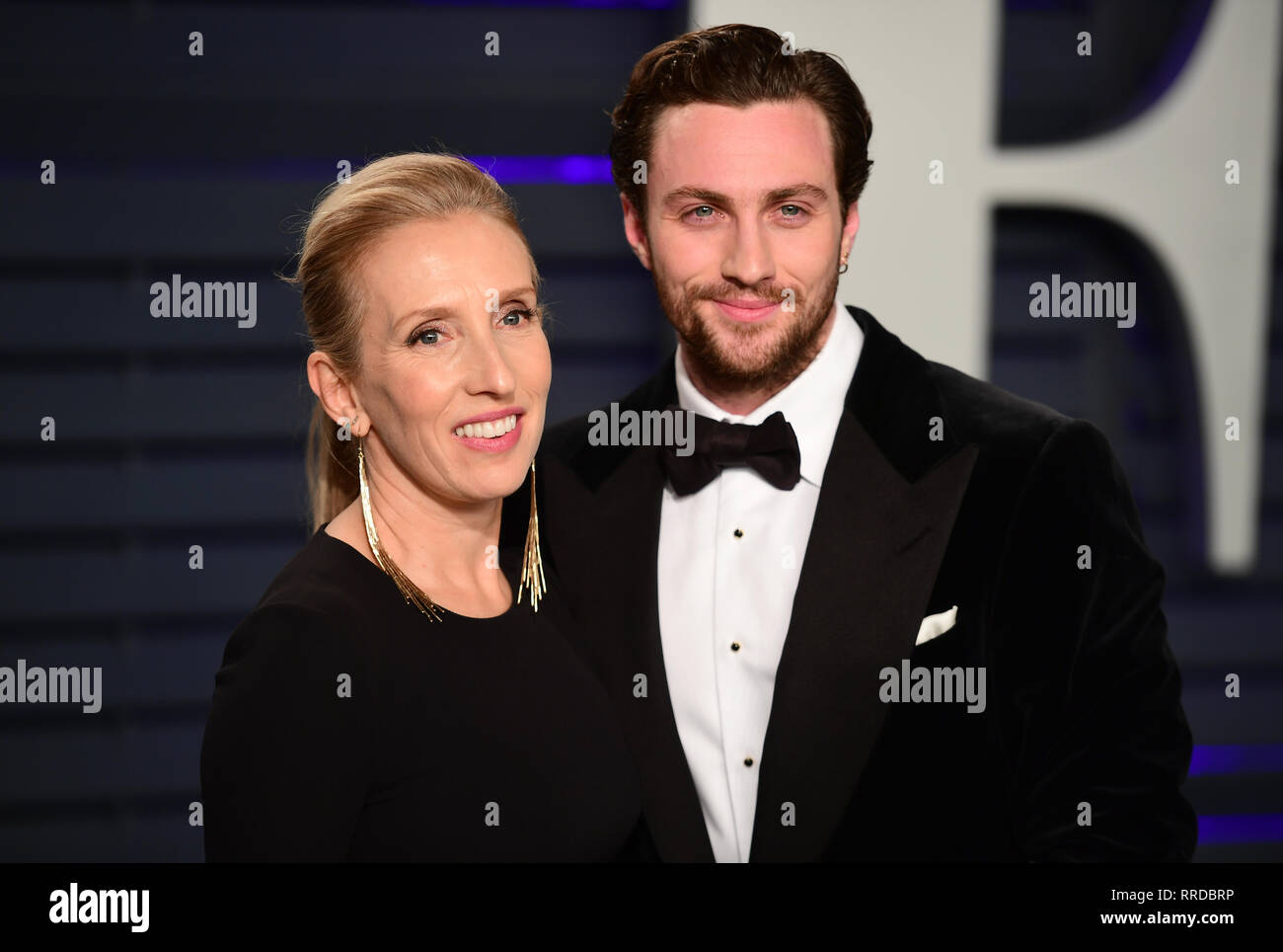 Sam Taylor-Johnson and Aaron Taylor-Johnson attending the Vanity Fair Oscar Party held at the Wallis Annenberg Center for the Performing Arts in Beverly Hills, Los Angeles, California, USA. Stock Photo