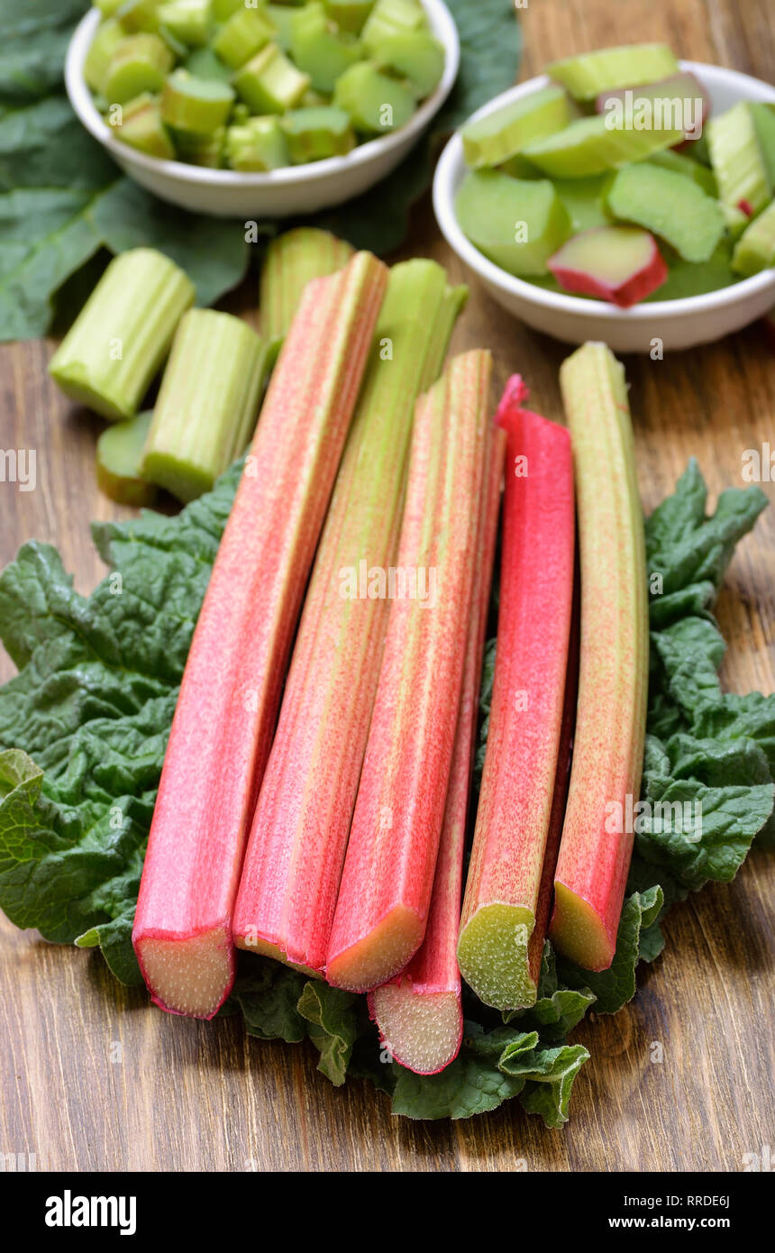 Fresh rhubarb on wooden table Stock Photo