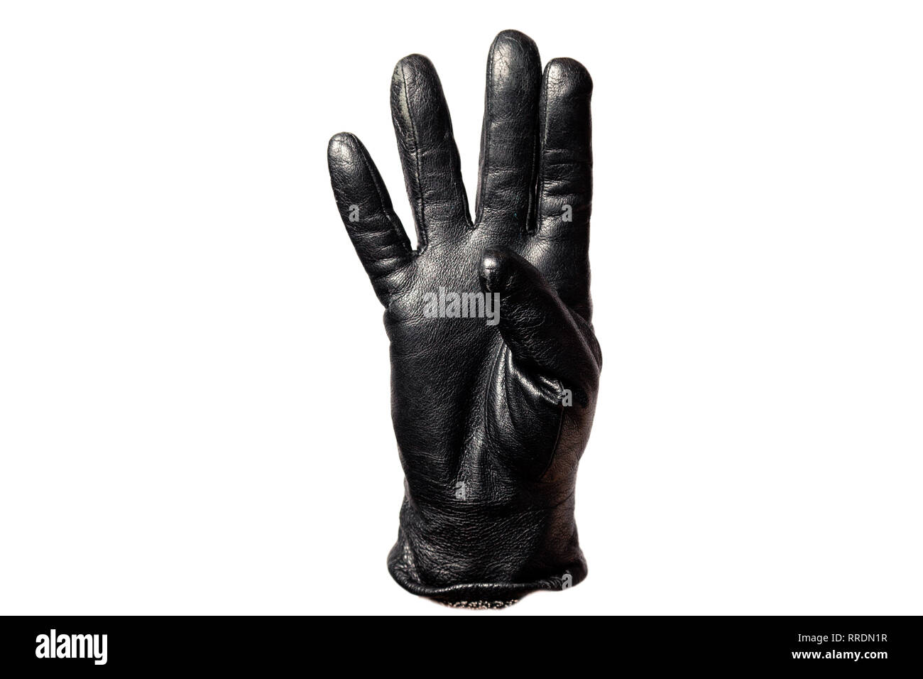 Closeup black leather glove, fingers showing number four. Isolated on
