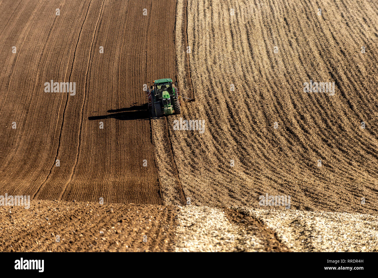 BRIGHTON, ENGLAND - FEBRUARY 25: A farmer preparing his fields for the spring at Falmer, near Brighton, England. (Photo by Andrew Hasson/Getty Images) Stock Photo