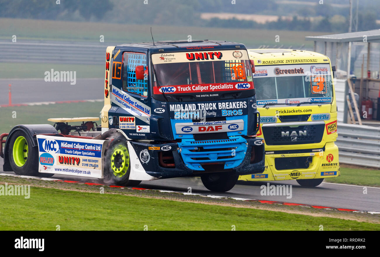 Brad Smith in the DAF CF, Division 2, Championship truck racing event at Snetterton 2018, Norfolk, UK. Passing Steve Powell's MAN TGS. Stock Photo