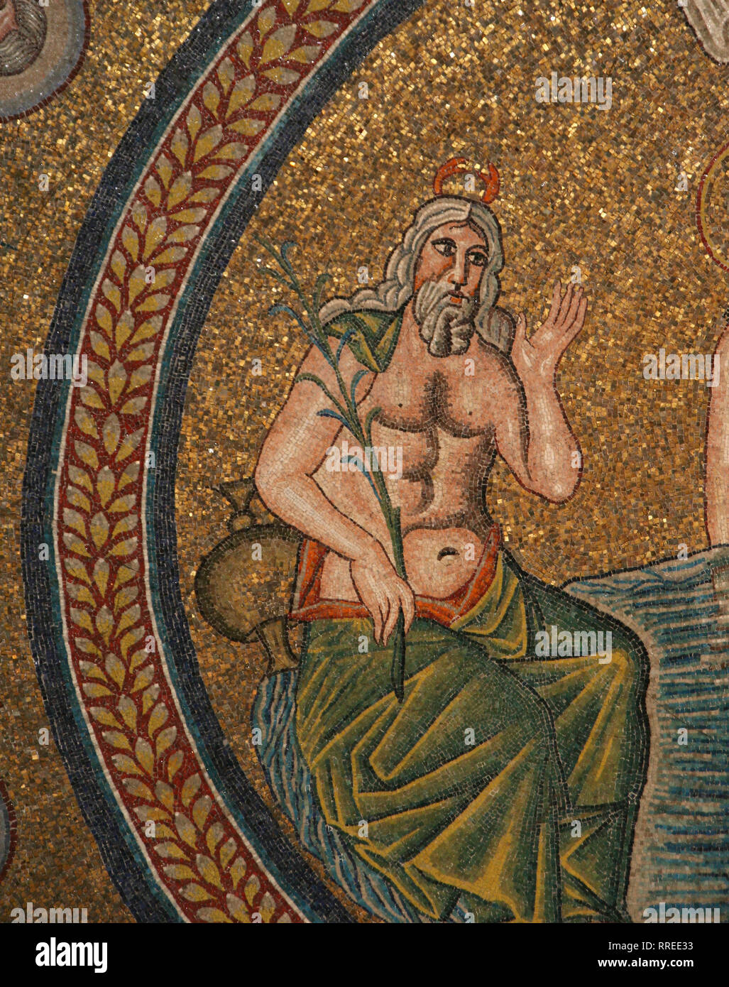 Italy. Ravenna. Arian Baptistery.  Theodoric the Great era. 5th-6th CE. Bautism Jesus. Personification Jordan river. Mosaic. Detail. Stock Photo