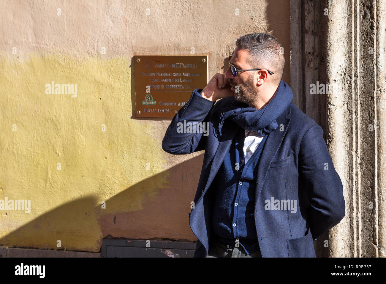 Man in Rome calling with cellphone Stock Photo