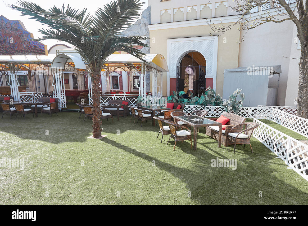 patio with lawn near the cozy hotel Stock Photo Alamy