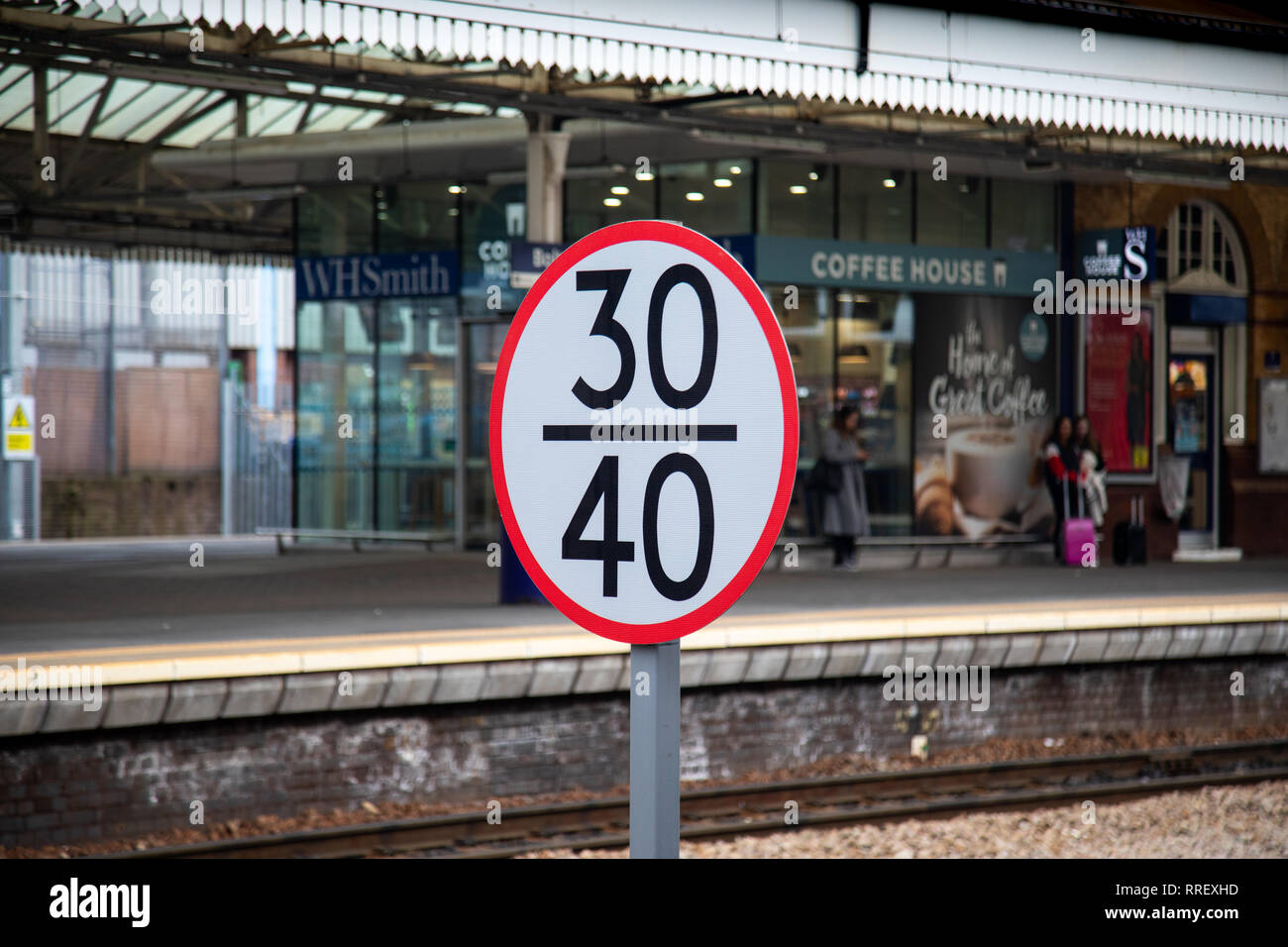 A UK railway speed limit sign. The upper number is the speed limit in