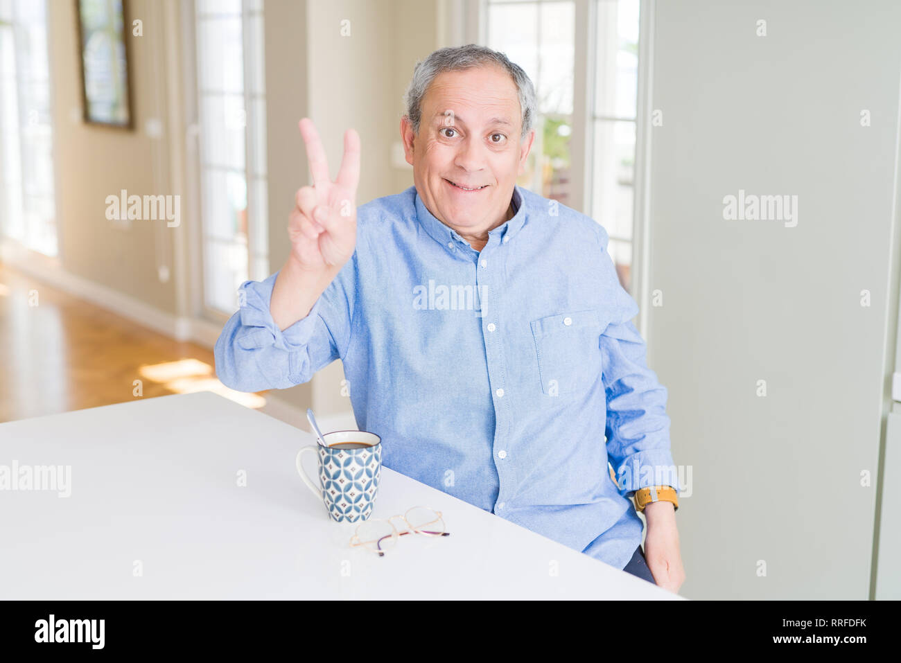 Man winking and tea hi-res stock photography and images - Alamy
