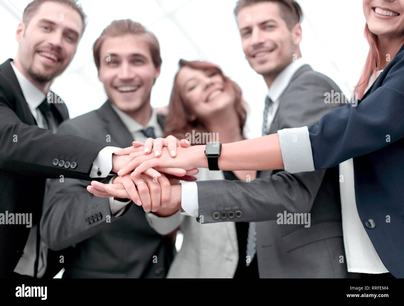 happy business team celebrating victory in office Stock Photo - Alamy
