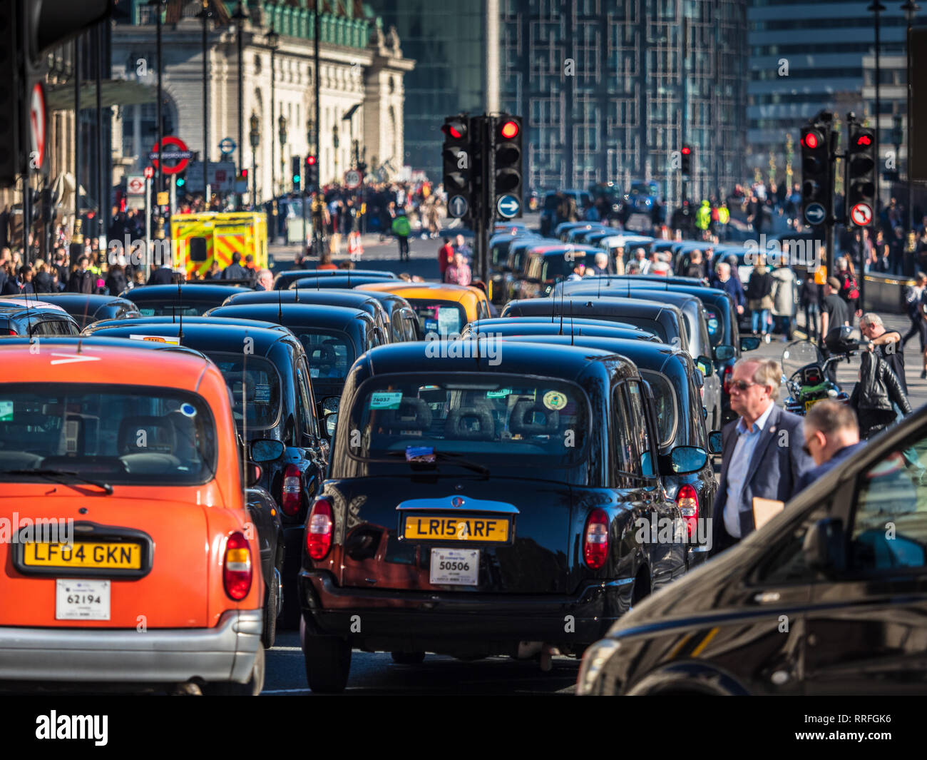 London Taxi Queue - London Taxis queue near Westminster Bridge in Central London London Black Cabs. Stock Photo
