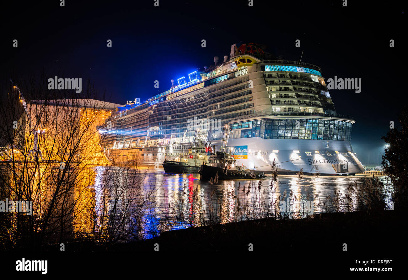 Papenburg, Germany. 25th Feb, 2019. The cruise ship 'Spectrum of the Seas' leaves the Meyer Werft building dock II. After undocking, the ship moors at the shipyard's equipment pier to receive a chimney fairing. Credit: Mohssen Assanimoghaddam/dpa/Alamy Live News Stock Photo
