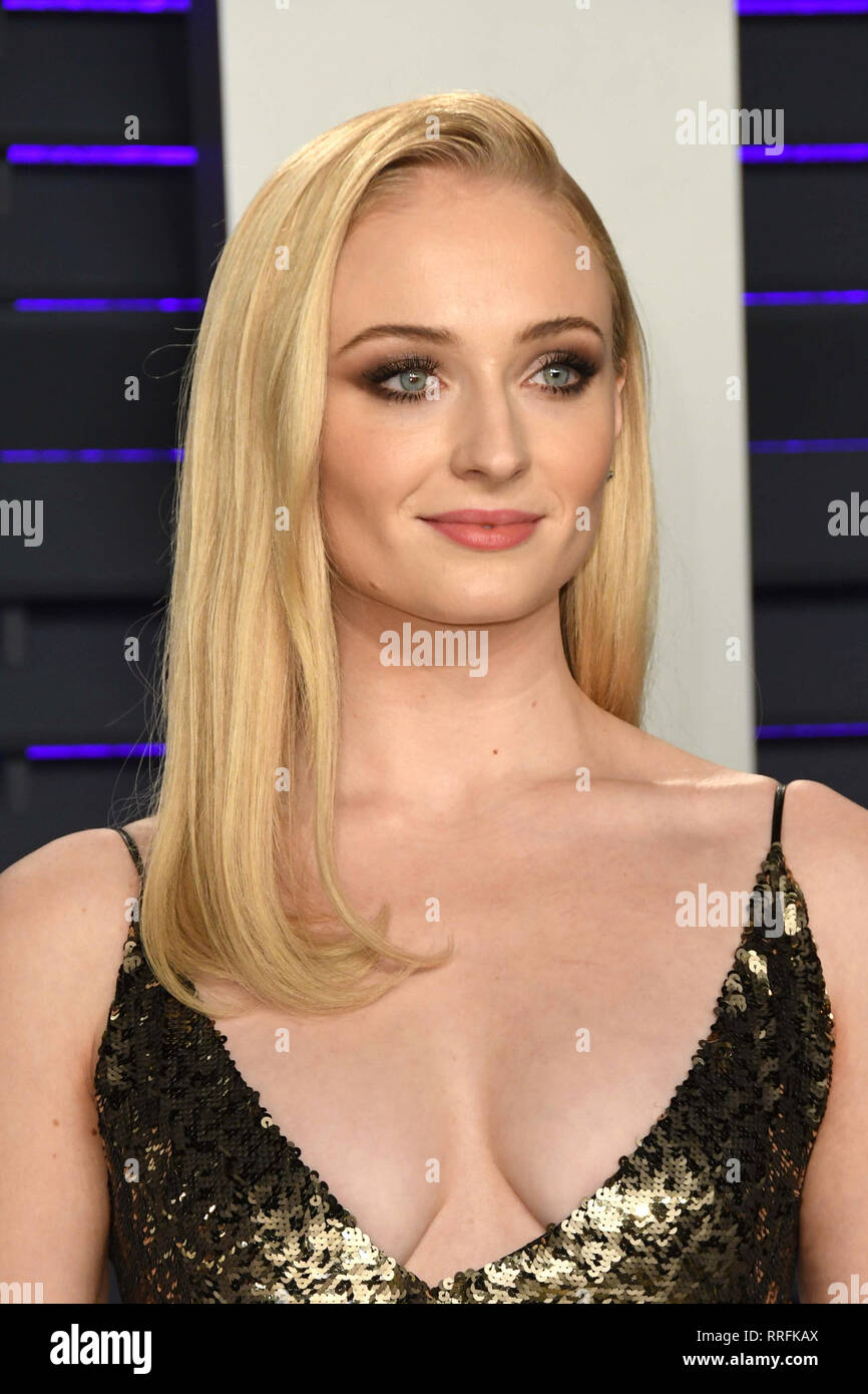 BEVERLY HILLS, LOS ANGELES, CA, USA - FEBRUARY 24: Actress Sophie Turner  wearing a Louis Vuitton dress arrives at the 2019 Vanity Fair Oscar Party  held at the Wallis Annenberg Center for