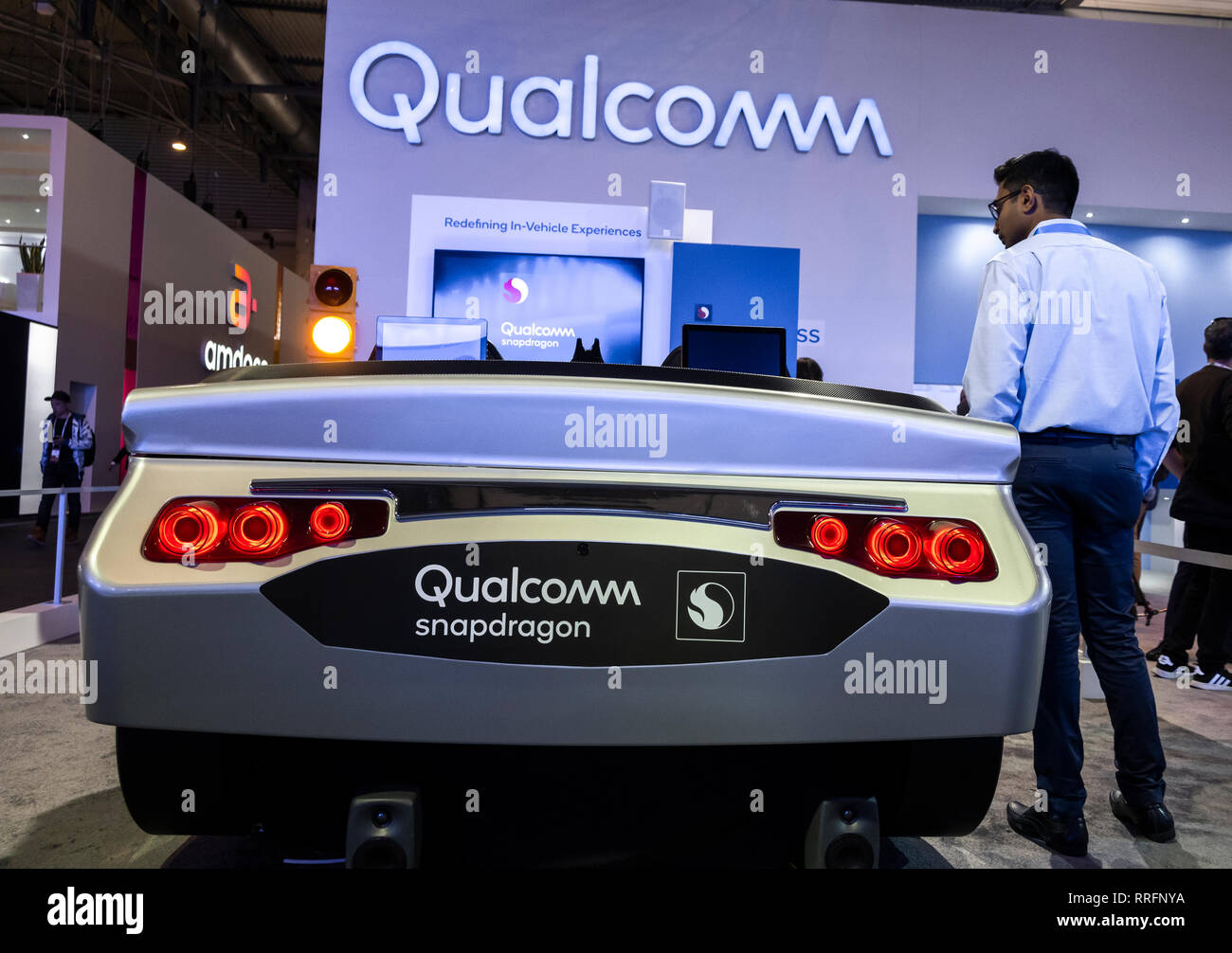 Qualcom's Redefining In-Vehicle Experiences is seen during MWC2019. The MWC2019 Mobile World Congress opens its doors to showcase the latest news of the manufacturers of smart phones. The presence of devices prepared to manage 5G communications has been the hallmark of this edition. Stock Photo