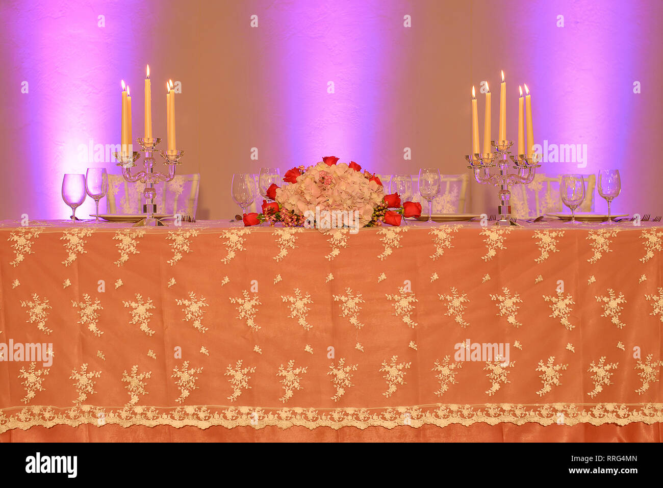 Wedding reception or fine dining table setup with embroidered organza