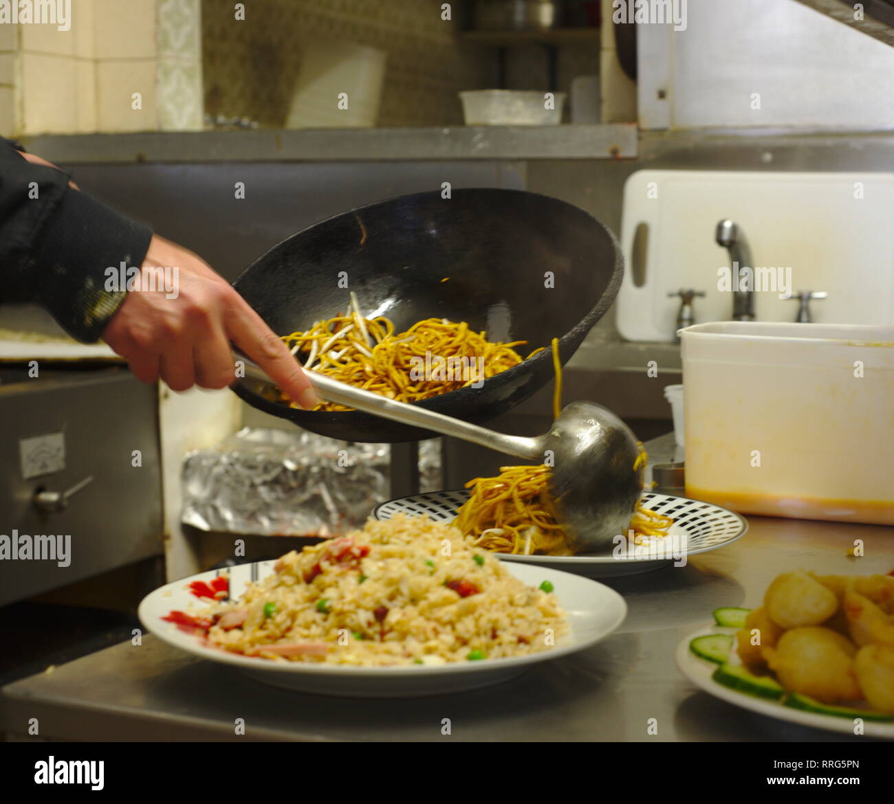 Chinese takeaway kitchen food preparation Stock Photo