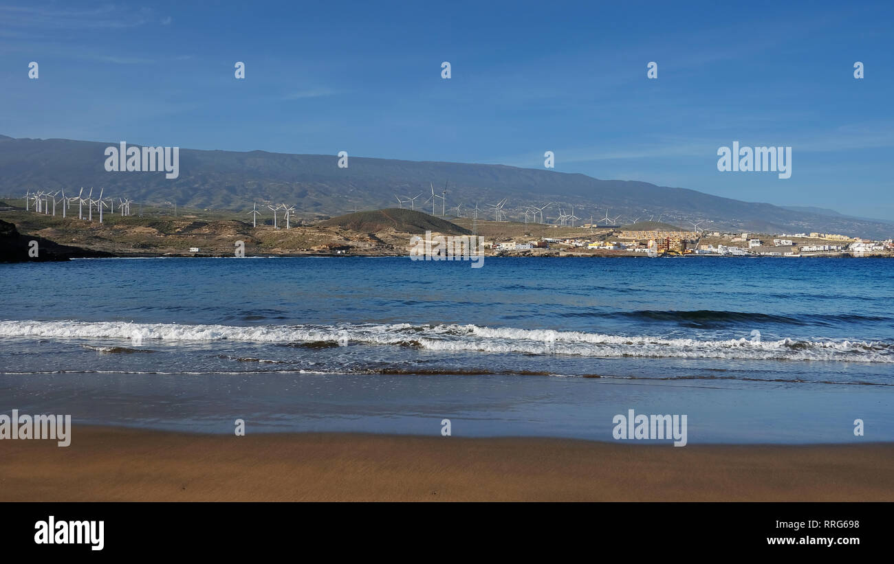Empty and clean beautiful beach with inland views of the south-eastern coast of the island, at Playa Poris de Abona, Tenerife, Canary Islands, Spain Stock Photo