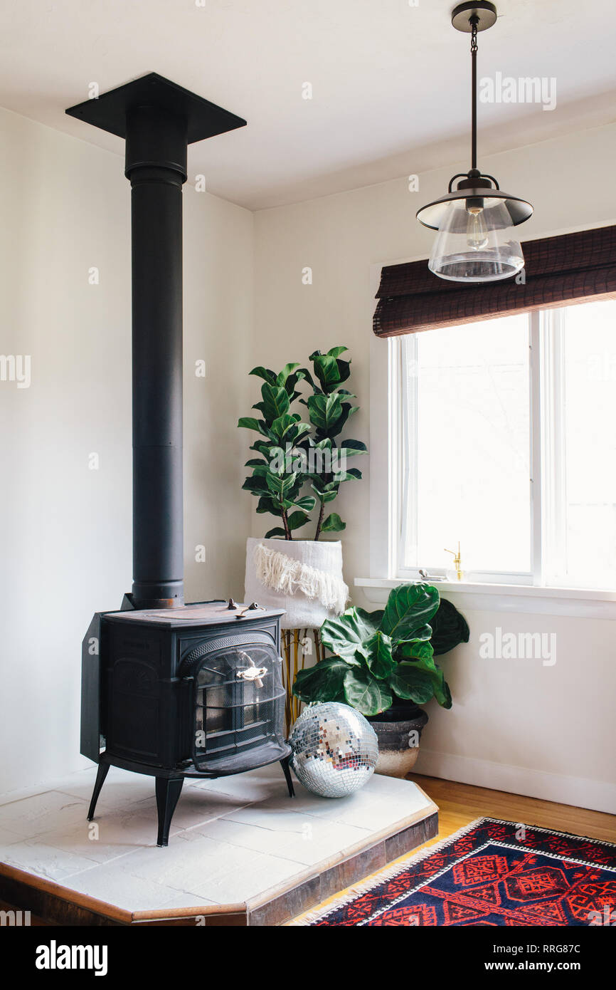 Wood Burning Stove in Corner of Living Room Stock Photo Alamy