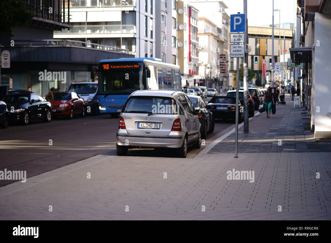 Kaiserslautern, Germany - September 17, 2018: Parking cars and bus traffic in Richard-Wagner-Street, a residential and commercial street on September  Stock Photo