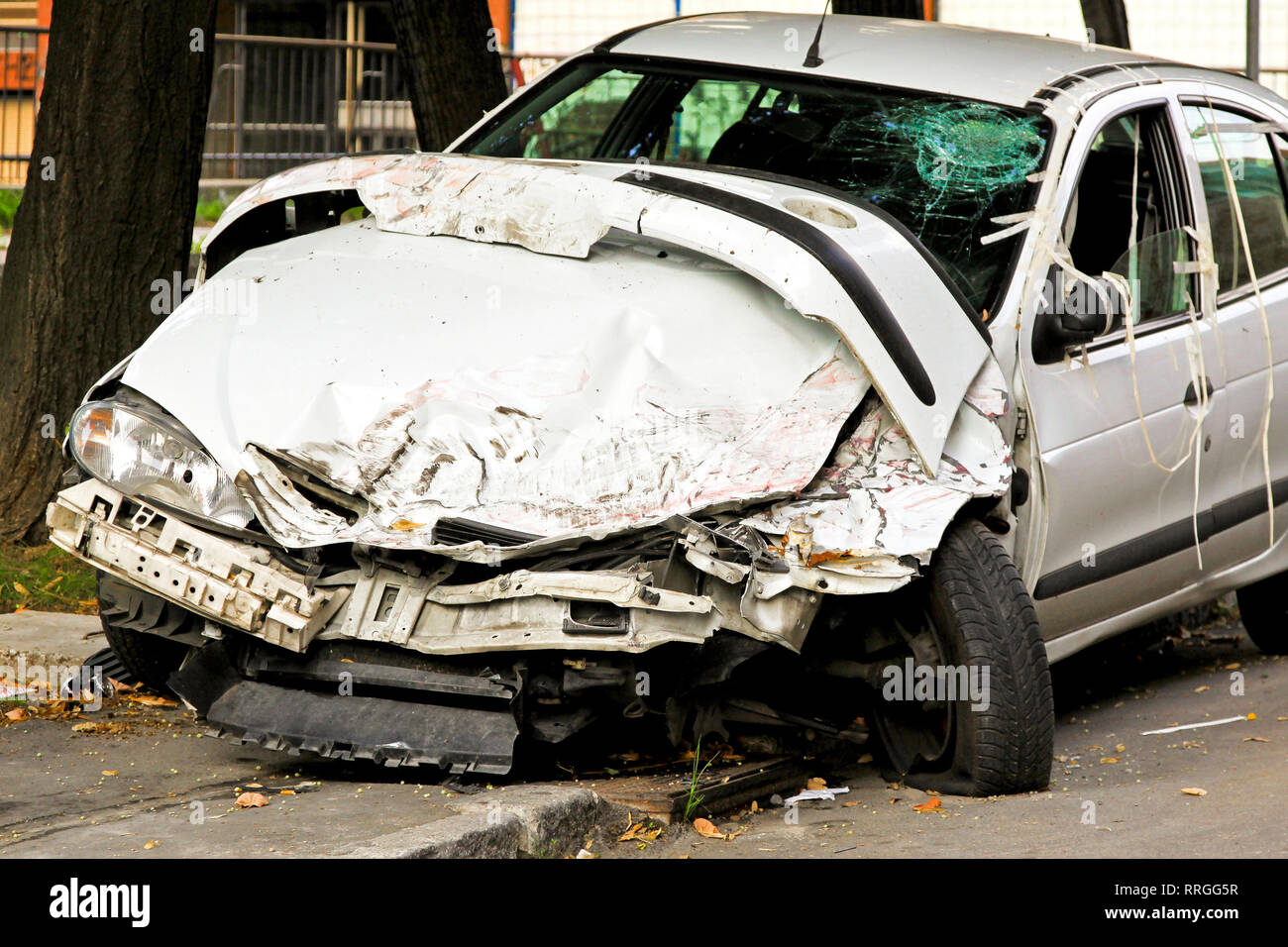 Fatal traffic accident with total damage of white car Stock Photo