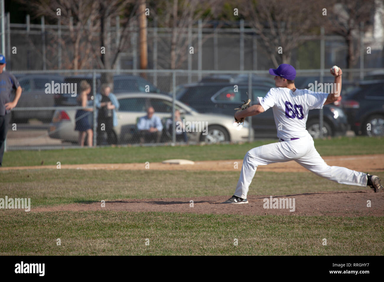 Baseball player pitching at CretinDerham High School game. St Paul