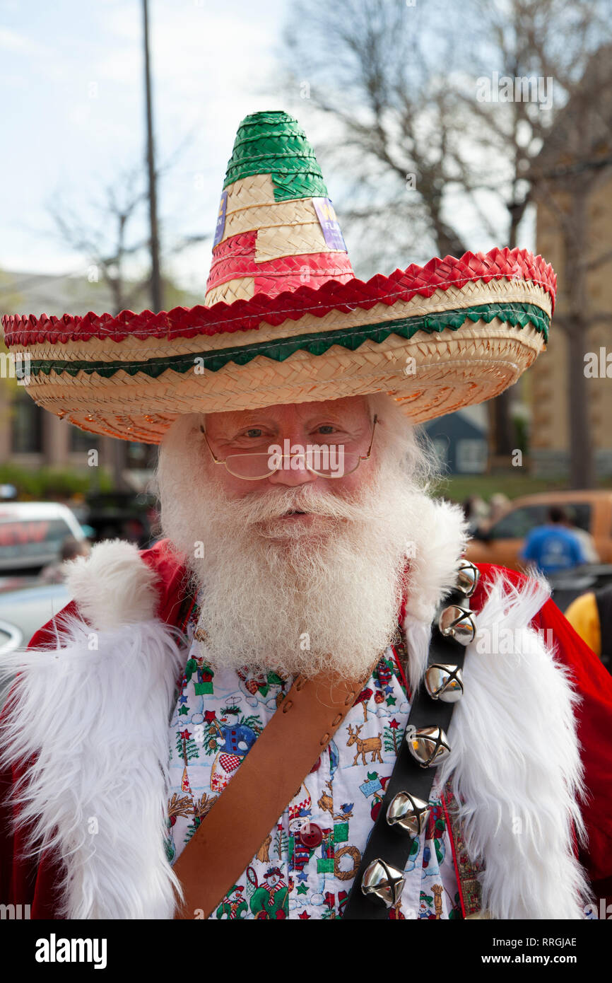 Mexican Santa Claus with sombrero, bells, decorated coat in the Cinco