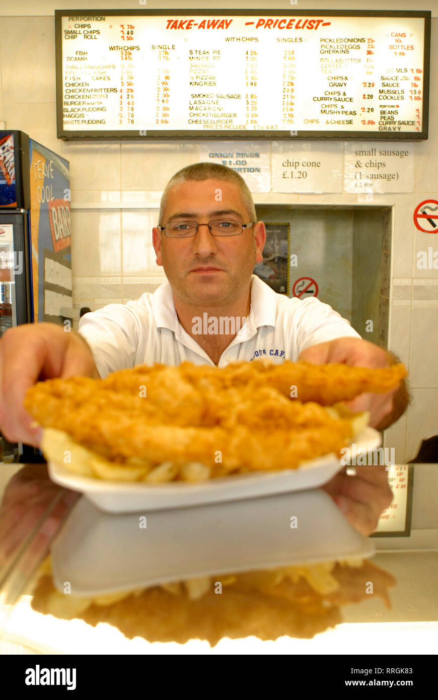 Gastronomy tourism fish and chips in a small shop in Girvan´s