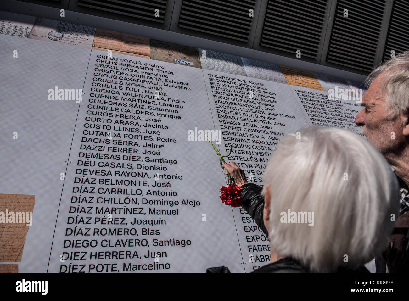 Relatives of the dead in Camp de la Bota concentration camp seen indicating  the names of their relatives. . Inauguration of the memorial space of the Camp  de la Bota in memory