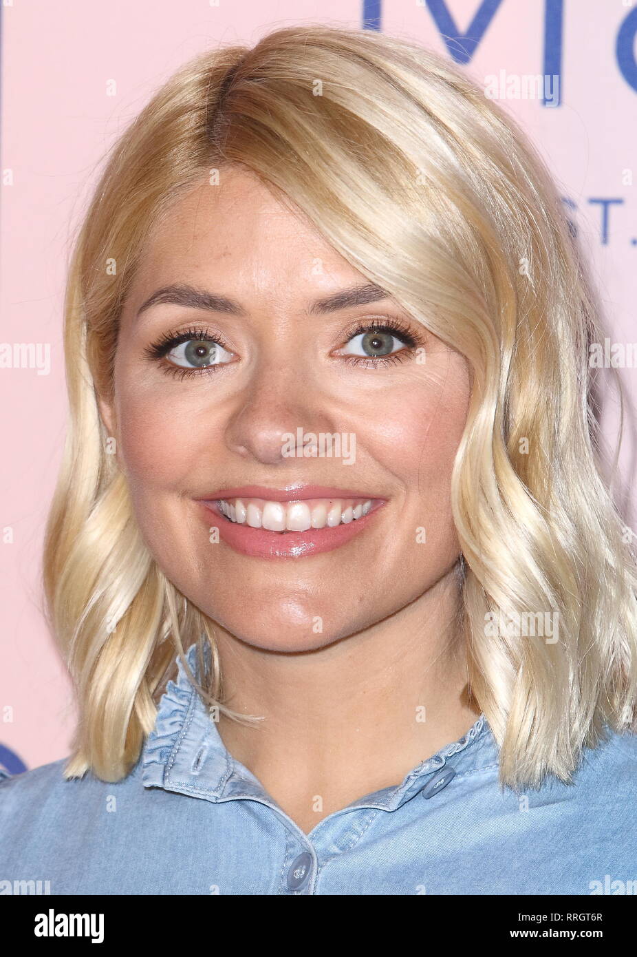 Holly Willoughby, ITV's This Morning presenter hosts press launch and exclusive preview at the Marks & Spencer, Westfield London.  Holly celebrates her new M&S Must-Haves collection by wearing some of the denim range of clothes Stock Photo