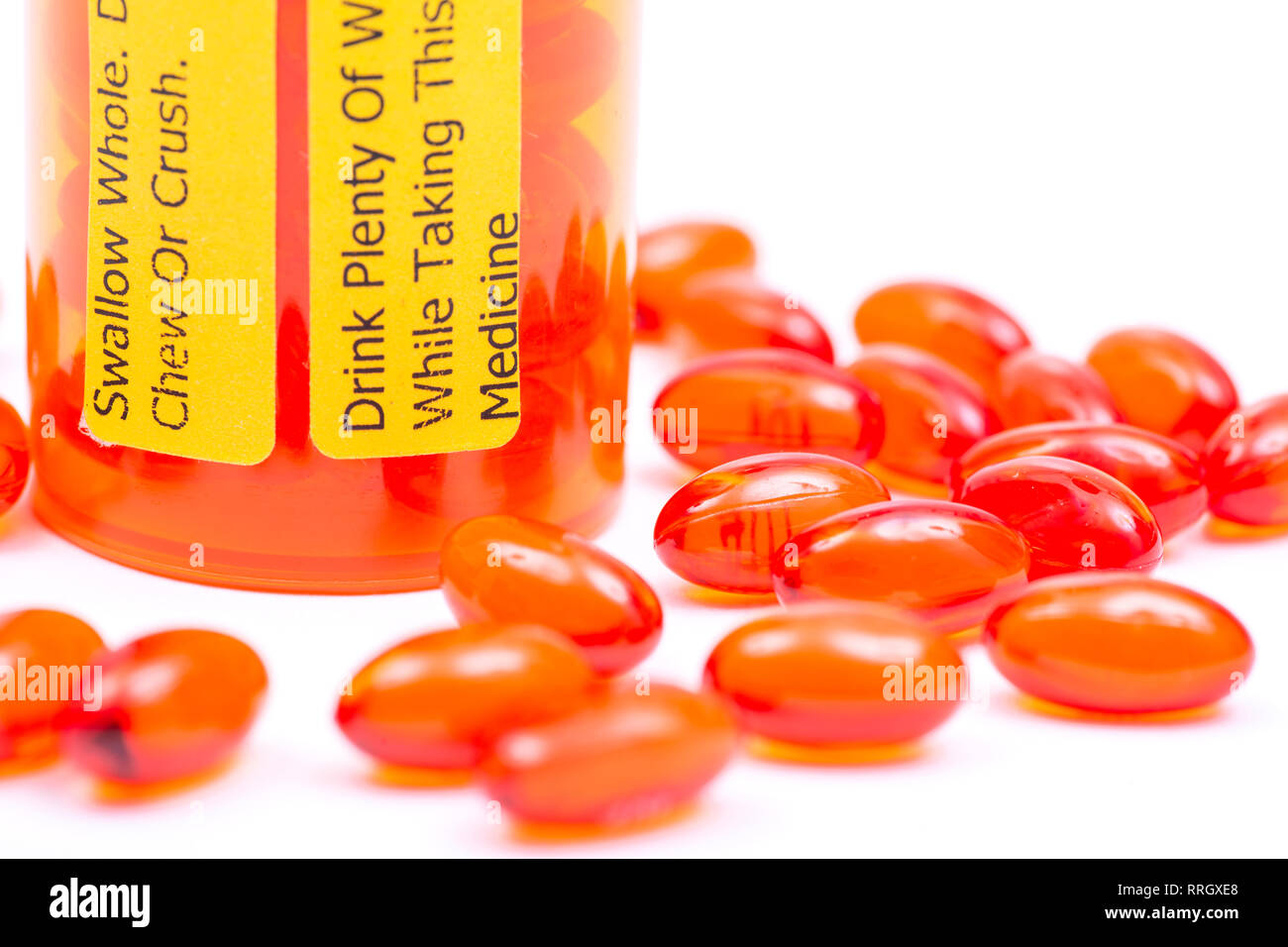 Docusate. Swallow whole Do not chew or crush Drink plenty of water while taking this medicine LABELS Stock Photo