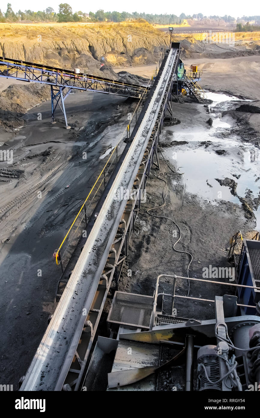 Black coal on a conveyor belt hires stock photography and images Alamy