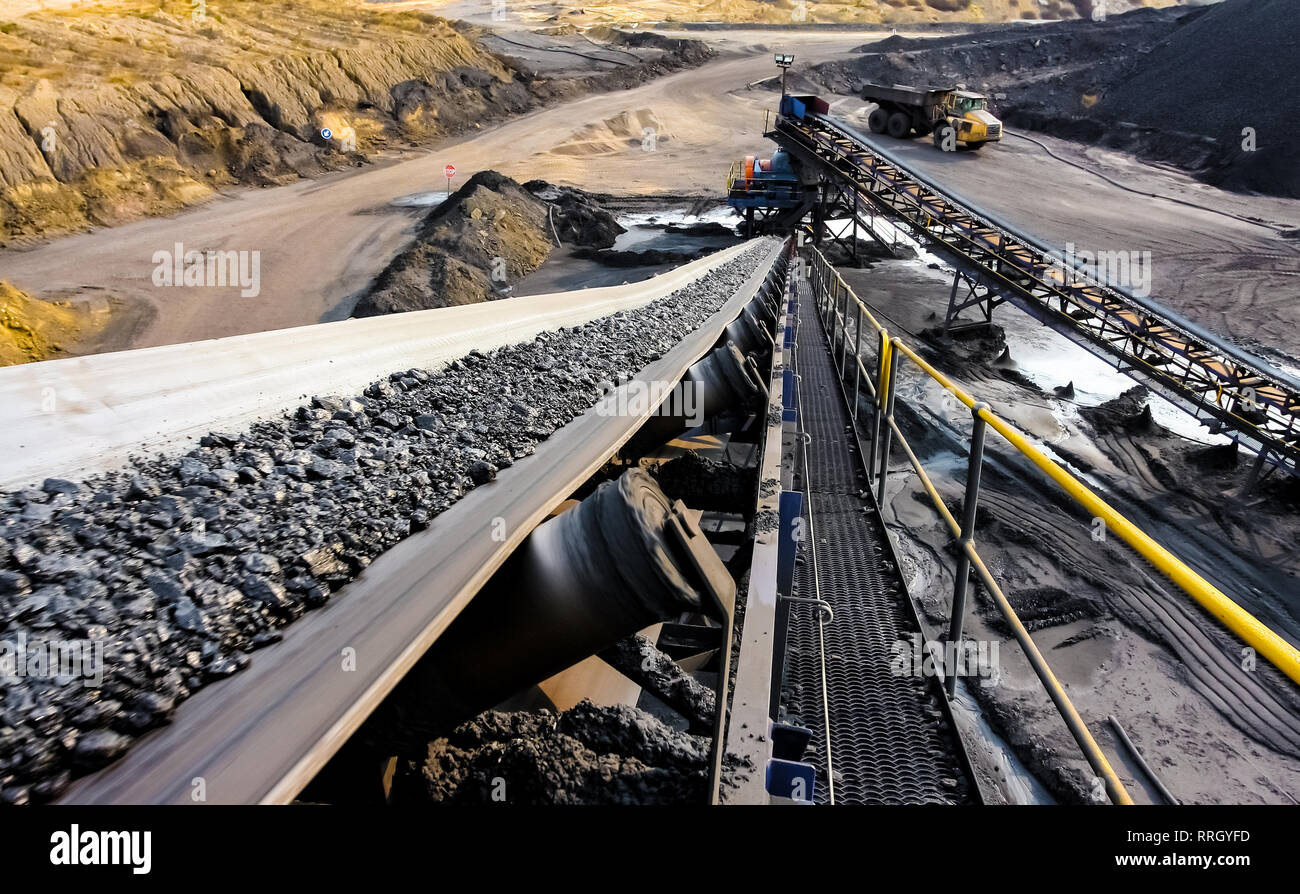 Black coal on a conveyor belt hires stock photography and images Alamy