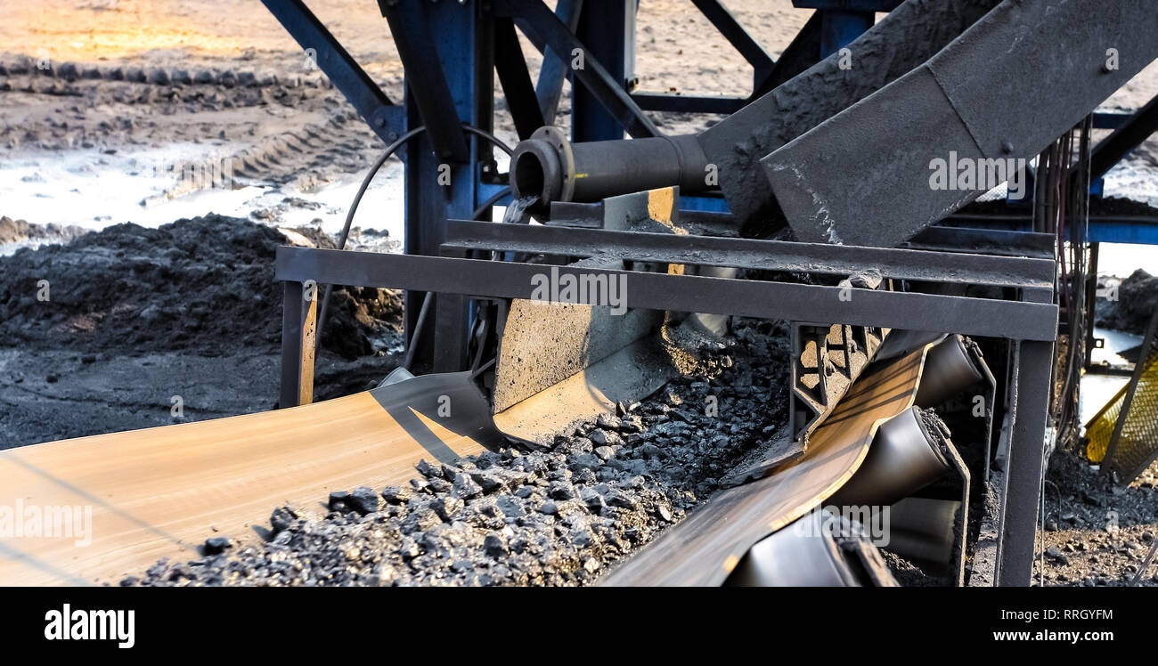 Black coal on a conveyor belt hires stock photography and images Alamy
