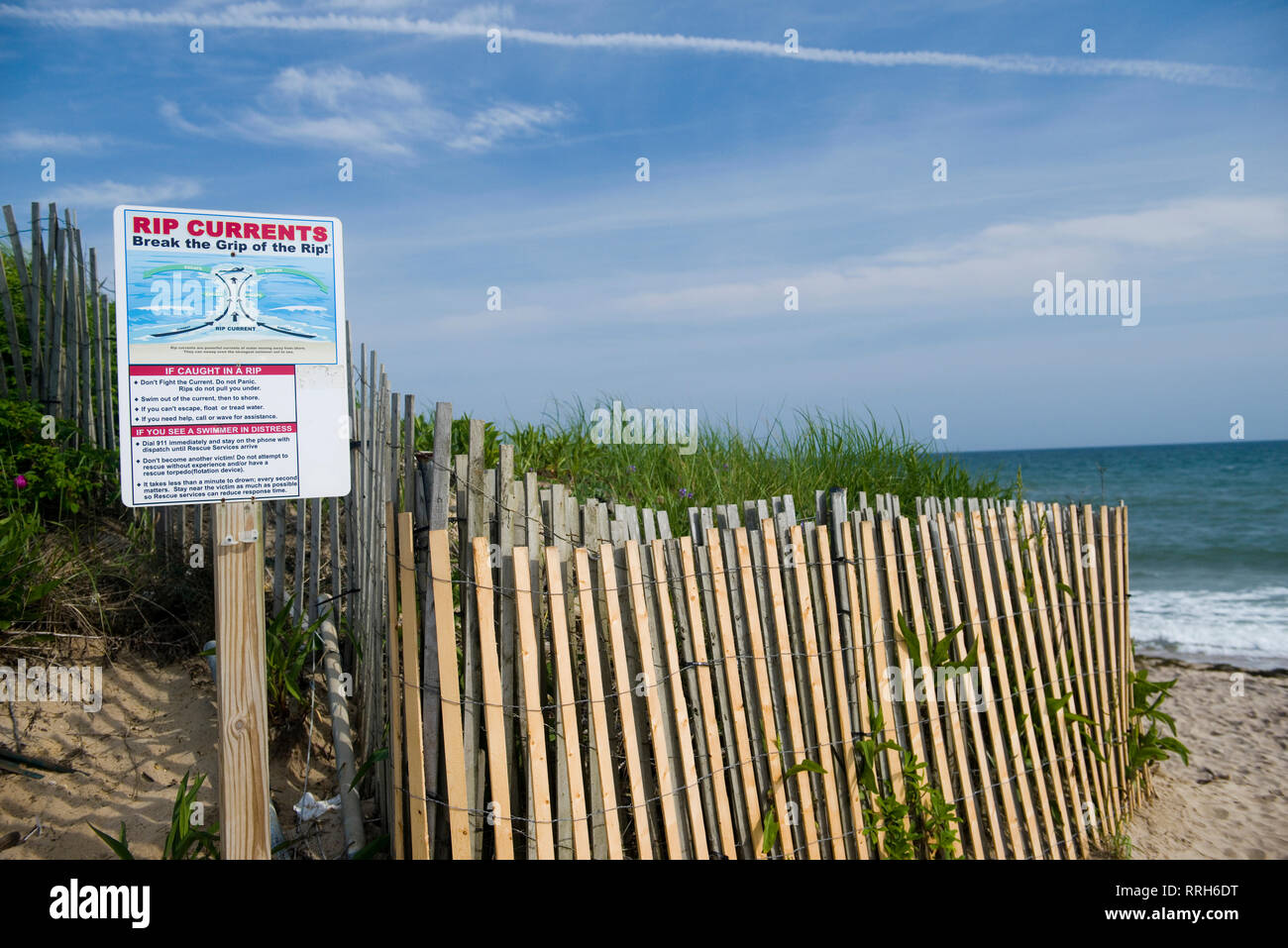 Ditch Plains beach entry Montauk Long Island New York in the Hamptons with rip current warning sign Stock Photo