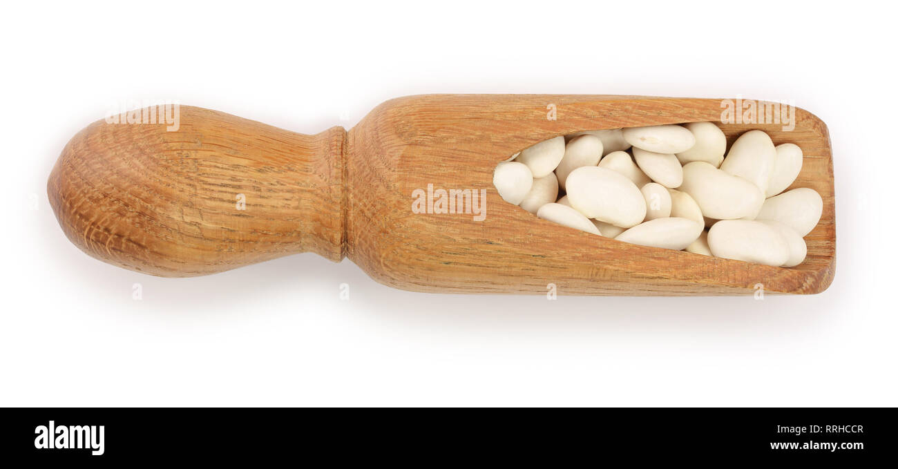 white kidney bean in wooden scoop isolated on white background. Top view. Flat lay Stock Photo