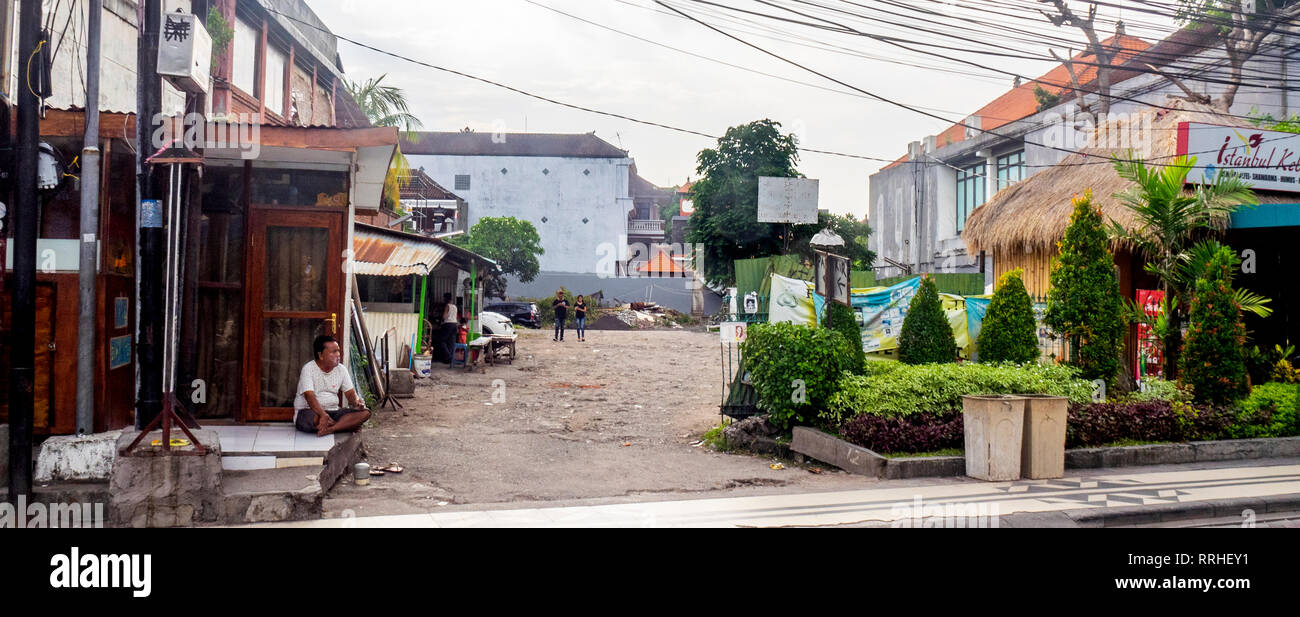 Vacant lot used for parking was 2002 Bali Bombings site of the Sari Club in Kuta Bali Indonesia. Stock Photo