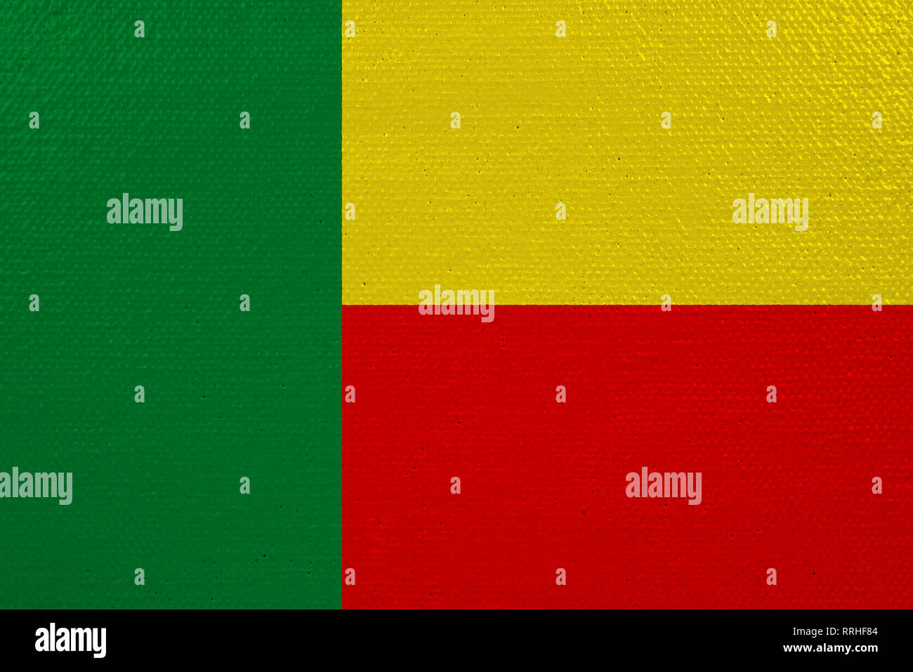 Benin flag on canvas. Patriotic background. National flag of Benin