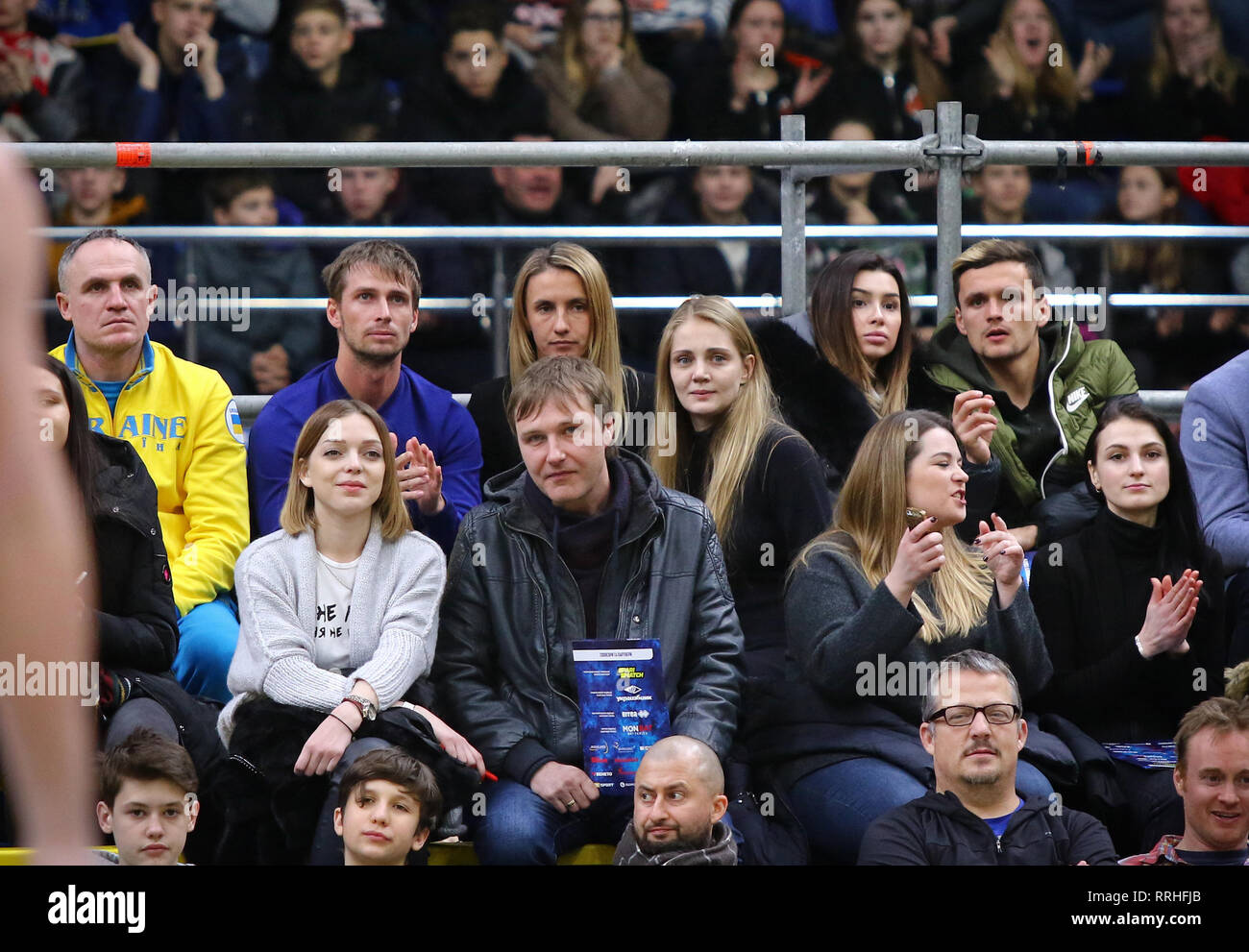 KYIV, UKRAINE - FEBRUARY 22, 2019: Tennis players Lesia Tsurenko and Anna Chakvetadze (3rd and 4th from left in top row) watch the FIBA World Cup 2019 Stock Photo