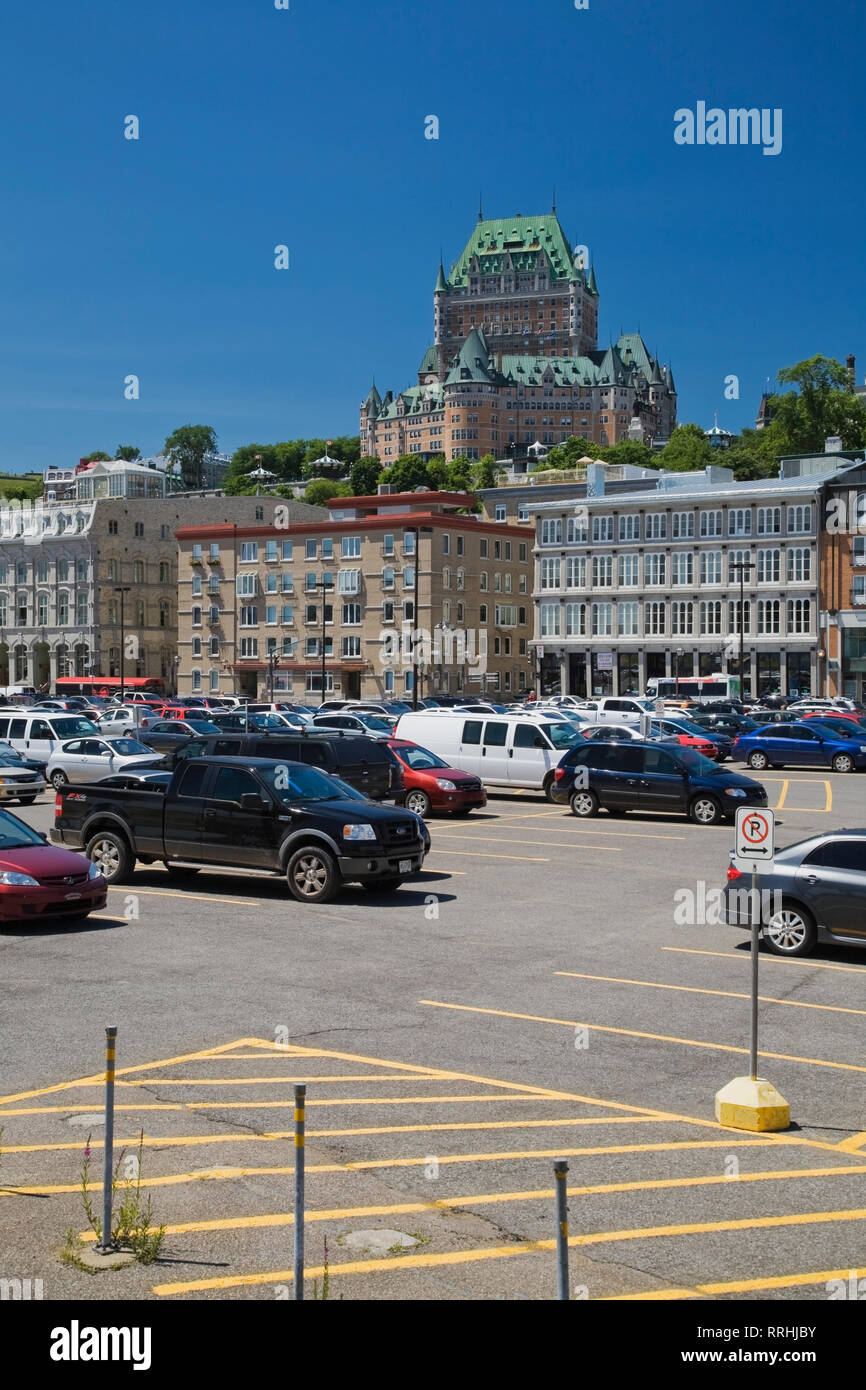 Parking Lot in Lower Town area of Old Quebec City with old buildings along Boulevard Champlain and Le Chateau Frontenac, Canada Stock Photo