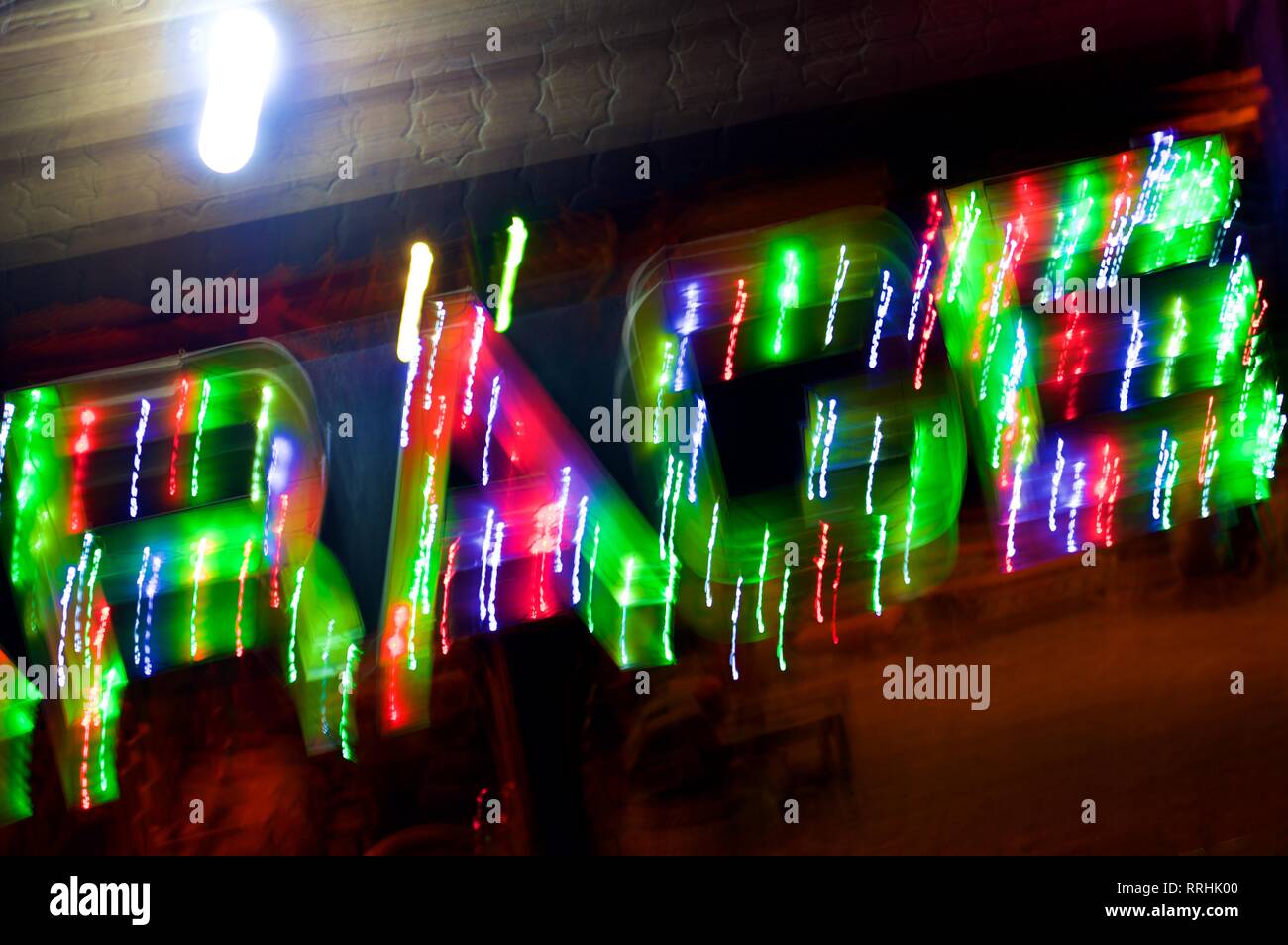 Abstract colored neon light background spelling RAGE Stock Photo - Alamy