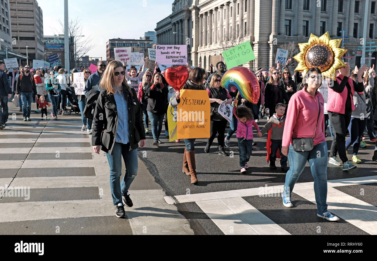 2019 Women's March participants make their way down Lakeside Avenue in downtown Cleveland, Ohio, USA bringing attention to women's equality. Stock Photo