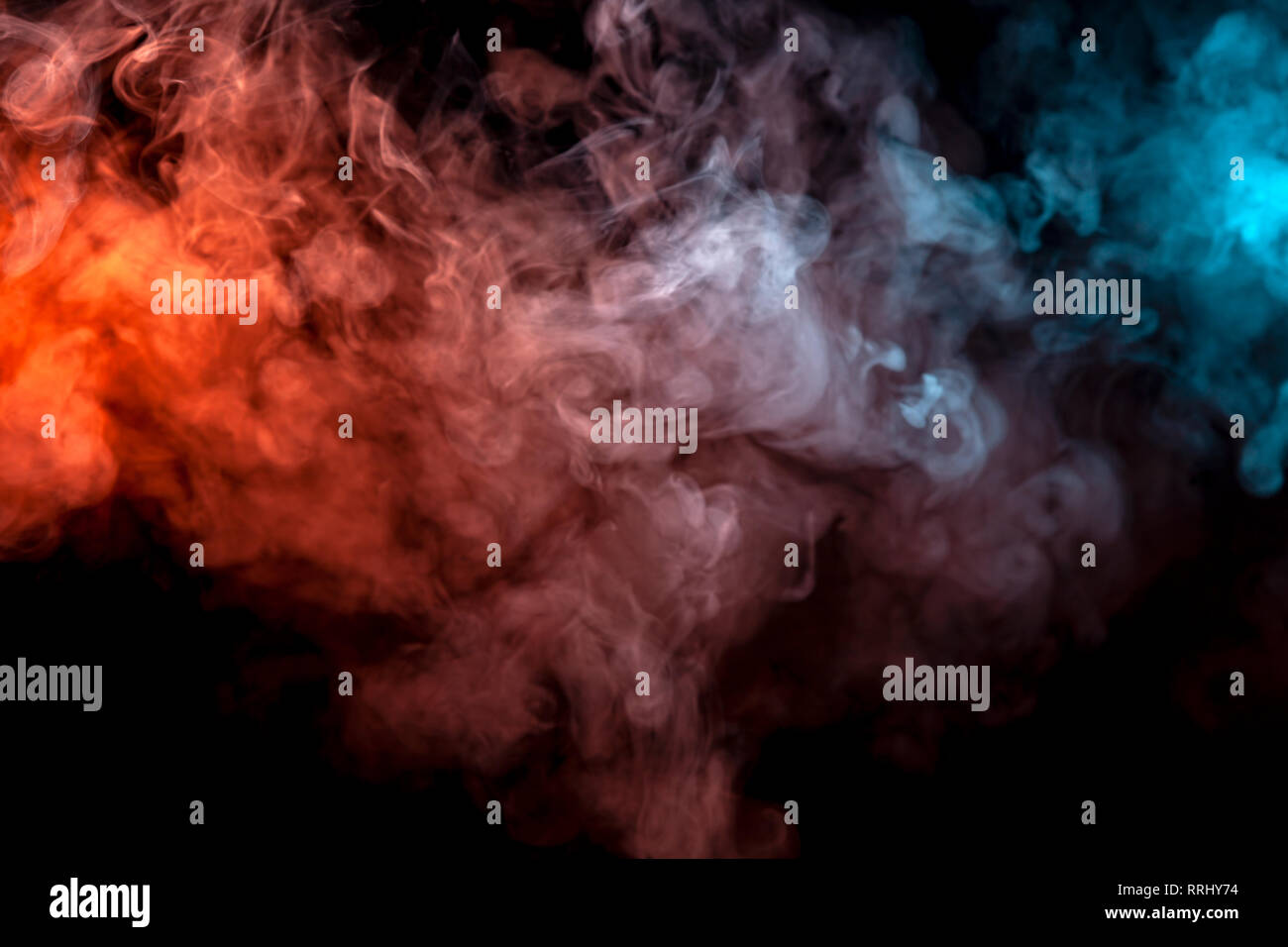 Background Of Orange Purple Red And Blue Wavy Smoke On A Black
