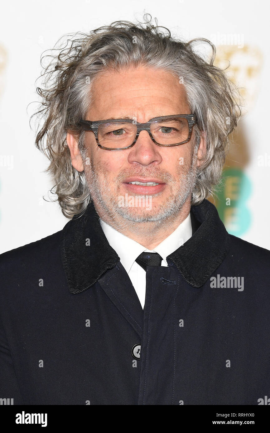 English actor Dexter Fletcher attends the EE British Academy Film Awards at The Royal Albert