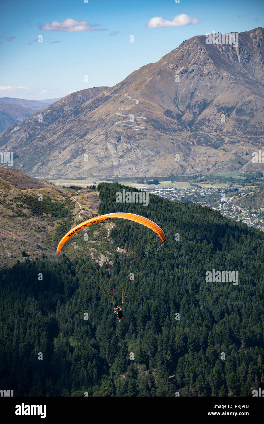 Paragliding towards Queenstown, south island, New Zealand. Stock Photo