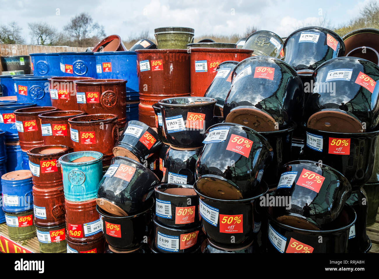Ceramic pots on sale at reduced prices in a garden centre. Stock Photo