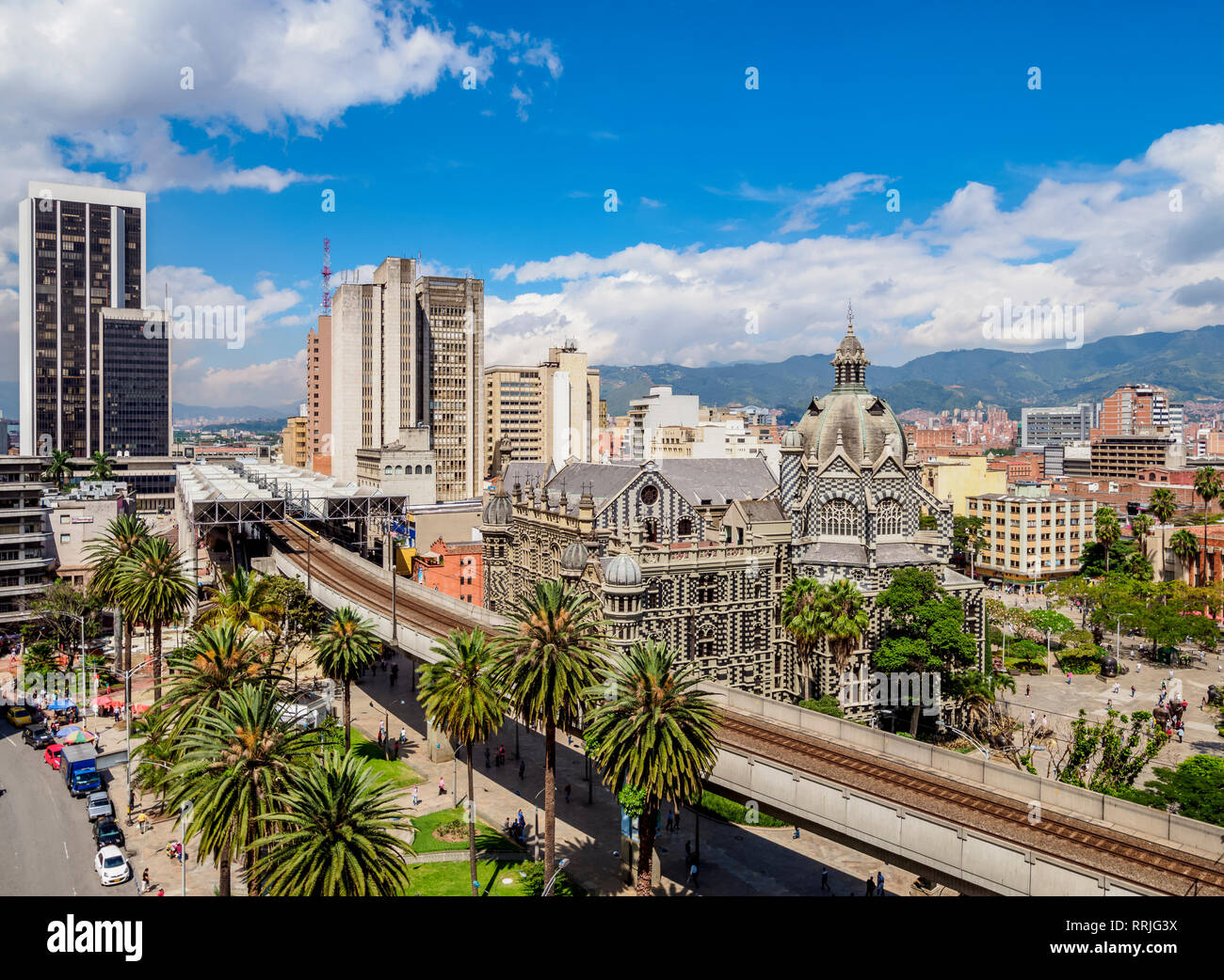 City Center skyline with Metro Line and Rafael Uribe Uribe Palace of Culture, Medellin, Antioquia Department, Colombia, South America Stock Photo
