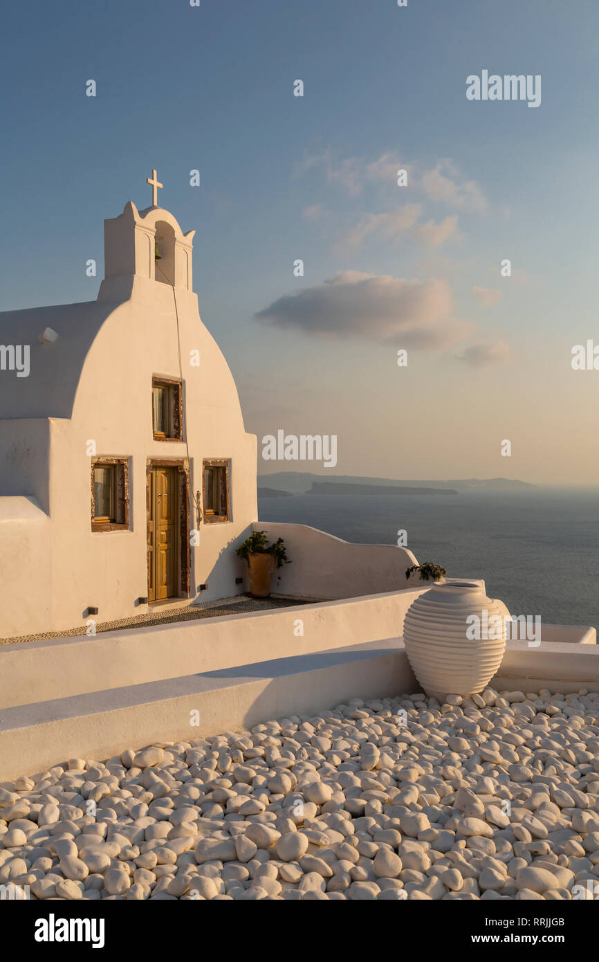 View of traditional white washed church at sunset in Oia, Santorini, Cyclades, Aegean Islands, Greek Islands, Greece, Europe Stock Photo