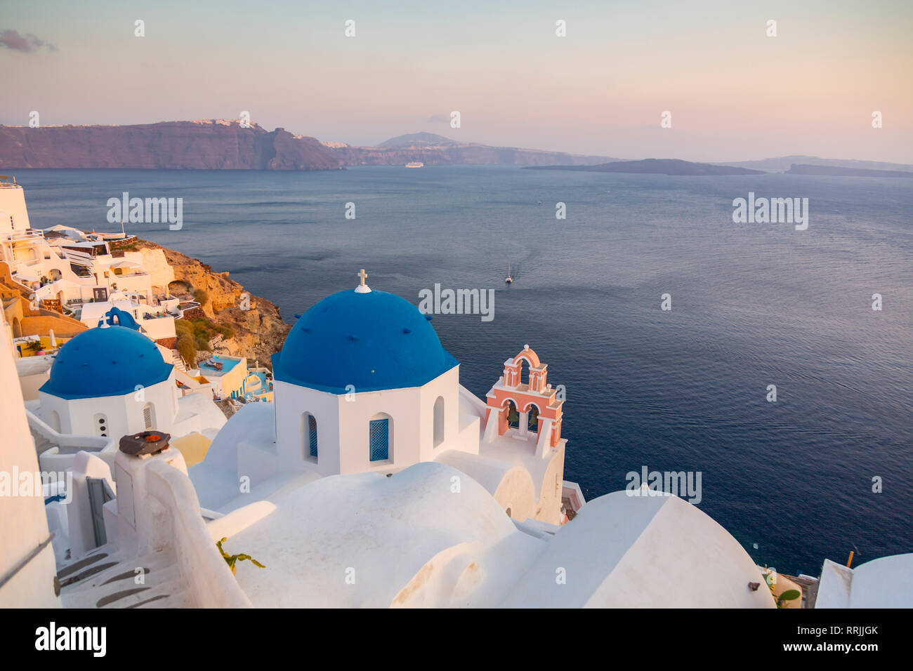 View of blue domes of churches in Oia village, Santorini, Cyclades, Aegean Islands, Greek Islands, Greece, Europe Stock Photo